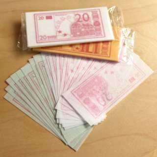 24 packets of Funny Money notes with approximately 18 notes per packet 