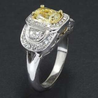 65 NATURAL FANCY YELLOW DIAMOND ESTATE COCKTAIL RING  