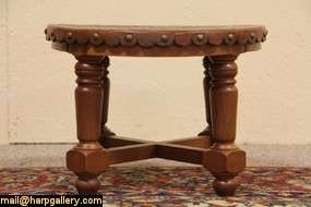   Colonial style stool from about 70 years ago has a coat of arms
