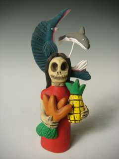 Mexican Oaxaca Day of Dead vendor by JOSEFINA AGUILAR  