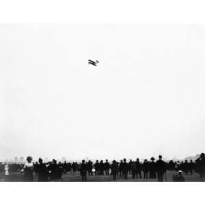  1909 photo Orville Wright flying in airplane, Berlin: Home 