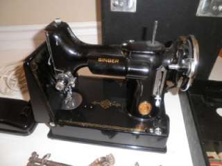This is a beautiful, vintage, antique SINGER Featherweight Flatbed 