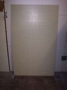 Pegboard 34 1/2 X 57 1/2 (have hundreds of pieces)  