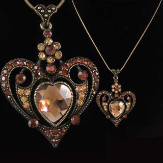   heart necklace adorned with brown rhinestones pendant size approx 1 5