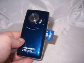 Sylvania HD1Z 64 MB Camcorder   Blue 8GB memory card 886004000372 