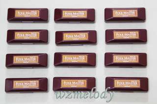 shell carrying case package included 12x suzuki folkmaster harmonica 