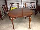 solid cherry dining table with 4 side chairs and one
